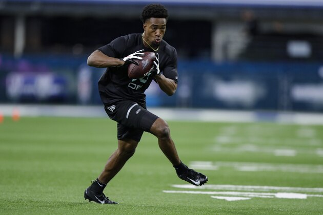 Florida defensive back C J Henderson runs a drill at the NFL football scouting combine in Indianapolis, Sunday, March 1, 2020. (AP Photo/Michael Conroy)