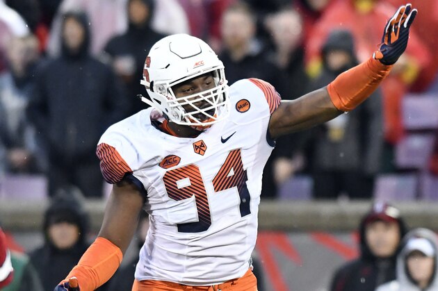 Syracuse defensive lineman Alton Robinson (94) during the first half of an NCAA college football game, Saturday, Nov. 18, 2017, in Louisville, Ky. (AP Photo/Timothy D. Easley)