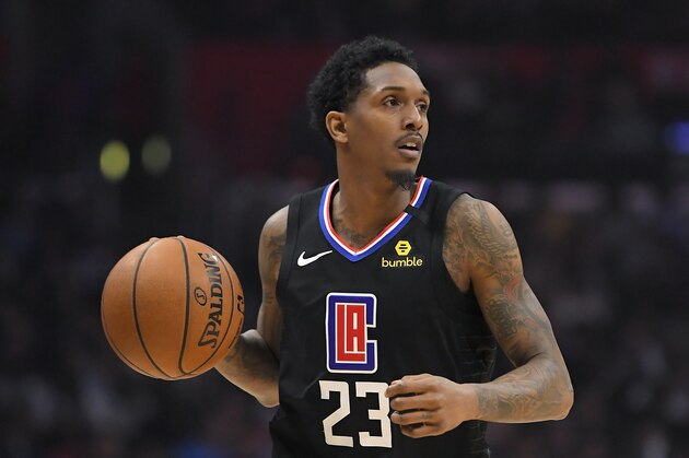 Los Angeles Clippers guard Lou Williams dribbles during the second half of an NBA basketball game against the Denver Nuggets Friday, Feb. 28, 2020, in Los Angeles. The Clippers won 132-103. (AP Photo/Mark J. Terrill)