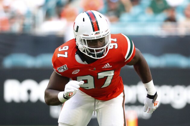 Miami defensive lineman Jonathan Garvin (97) is shown during the first half of an NCAA college football game against Bethune Cookman, Saturday, Sept. 14, 2019, in Miami Gardens, Fla. (AP Photo/Wilfredo Lee)