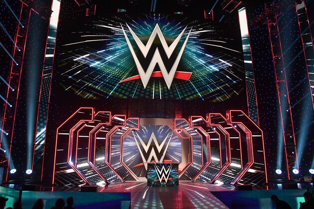 LAS VEGAS, NEVADA - OCTOBER 11:  WWE logos are shown on screens before a WWE news conference at T-Mobile Arena on October 11, 2019 in Las Vegas, Nevada. It was announced that WWE wrestler Braun Strowman will face heavyweight boxer Tyson Fury and WWE champion Brock Lesnar will take on former UFC heavyweight champion Cain Velasquez at the WWE's Crown Jewel event at Fahd International Stadium in Riyadh, Saudi Arabia on October 31.  (Photo by Ethan Miller/Getty Images)