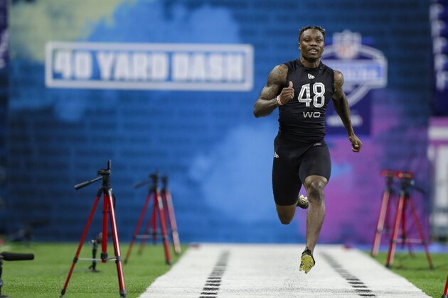 Alabama wide receiver Henry Ruggs III runs the 40-yard dash at the NFL football scouting combine in Indianapolis, Thursday, Feb. 27, 2020. (AP Photo/Michael Conroy)