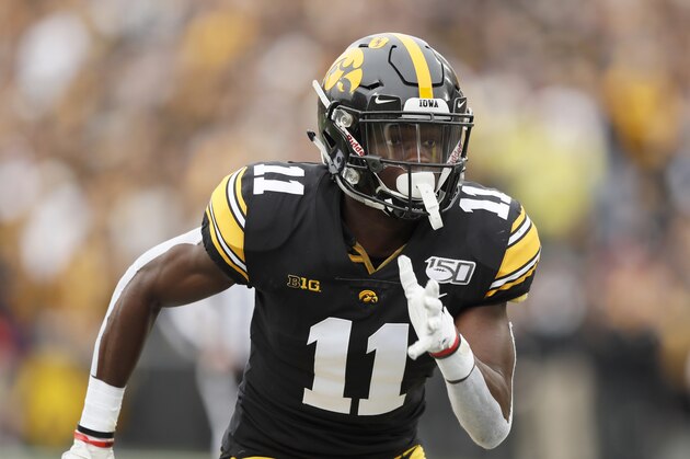 Iowa defensive back Michael Ojemudia runs up field during the first half of an NCAA college football game against Purdue, Saturday, Oct. 19, 2019, in Iowa City, Iowa. (AP Photo/Charlie Neibergall)