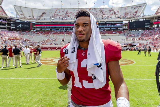 Alabama quarterback Tua Tagovailoa (13) walks off the field victorious celebrate after a 49-7 win over Southern Miss in an NCAA college football game, Saturday, Sept. 21, 2019, in Tuscaloosa, Ala. (AP Photo/Vasha Hunt)