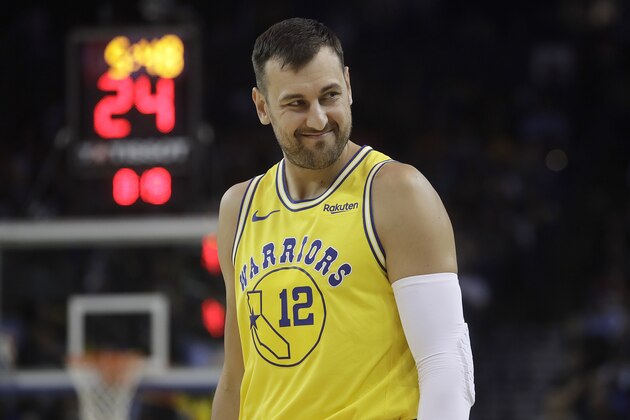 Golden State Warriors center Andrew Bogut (12) against the Denver Nuggets during an NBA basketball game in Oakland, Calif., Tuesday, April 2, 2019. (AP Photo/Jeff Chiu)