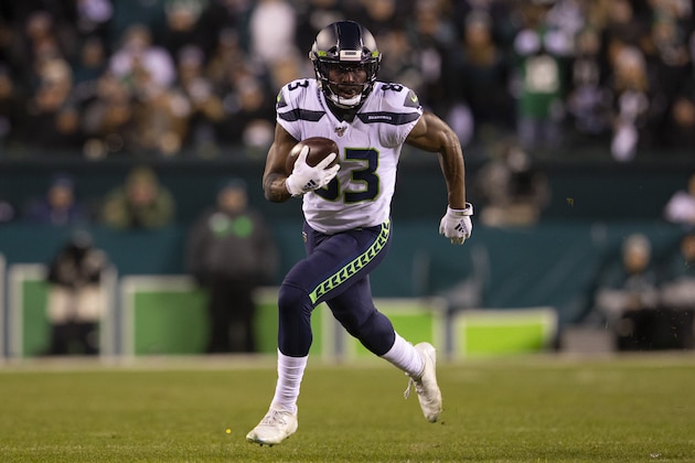 PHILADELPHIA, PA - JANUARY 05: David Moore #83 of the Seattle Seahawks runs with the ball during the NFC Wild Card game against the Philadelphia Eagles at Lincoln Financial Field on January 5, 2020 in Philadelphia, Pennsylvania. (Photo by Mitchell Leff/Getty Images)