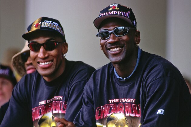 CHICAGO, IL - JUNE 16: Scottie Pippen #33, and Michael Jordan #23 of the Chicago Bulls are seen smiling at the Chicago Bulls Championship Parade and Rally on June 16, 1997 at Grant Park in Chicago, Illinois. NOTE TO USER: User expressly acknowledges and agrees that, by downloading and/or using this Photograph, user is consenting to the terms and conditions of the Getty Images License Agreement. Mandatory Copyright Notice: Copyright 1997 NBAE (Photo by Steve Woltman/NBAE via Getty Images)