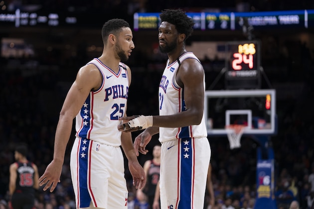 PHILADELPHIA, PA - FEBRUARY 09: Ben Simmons #25 of the Philadelphia 76ers talks to Joel Embiid #21 against the Chicago Bulls at the Wells Fargo Center on February 9, 2020 in Philadelphia, Pennsylvania. The 76ers defeated the Bulls 118-111. NOTE TO USER: User expressly acknowledges and agrees that, by downloading and/or using this photograph, user is consenting to the terms and conditions of the Getty Images License Agreement. (Photo by Mitchell Leff/Getty Images)