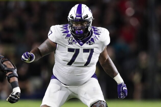 TCU offensive tackle Lucas Niang (77) plays against Purdue during the first half of an NCAA college football game in West Lafayette, Ind., Saturday, Sept. 14, 2019. (AP Photo/Michael Conroy)