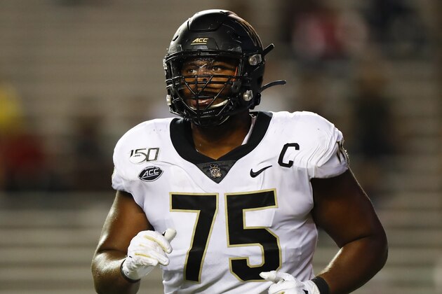 Wake Forest offensive lineman Justin Herron (75) jogs to position during an NCAA football game on Friday, Sept. 6, 2019 in Houston. (AP Photo/Matt Patterson)
