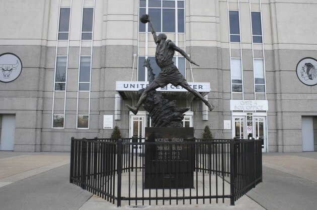 In this photo taken Feb. 28, 2012, a statue of former Chicago Bulls star Michael Jordan stands outside the United Center arena in Chicago. The