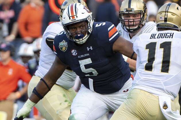 NASHVILLE, TN - DECEMBER 28: Derrick Brown #5 of the Auburn Tigers pressures David Blough #11 of the Purdue Boilermakers at Nissan Stadium on December 28, 2018 in Nashville, Tennessee. (Photo by Timothy Nwachukwu/Getty Images)