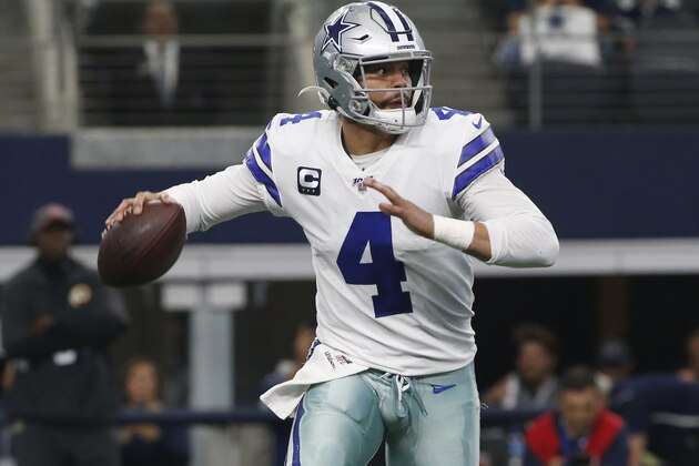 FILE - In this Dec. 15, 2019, file photo, Dallas Cowboys quarterback Dak Prescott looks to throw against the Washington Redskins during the first half of an NFL football game in Arlington, Texas.   The Cowboys continue to play the waiting game with their free agents. With the current collective bargaining agreement still in place and uncertainty whether a new one will be in force before the new league season begins next month, negotiations between Cowboys executive vice president Stephen Jones and Prescott have gone nowhere. (AP Photo/Ron Jenkins, File)
