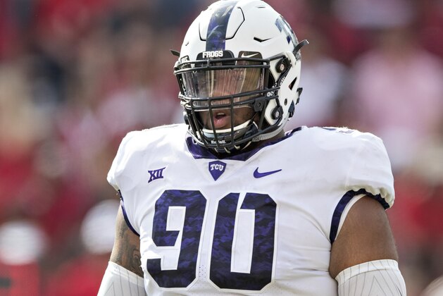 FAYETTEVILLE, AR - SEPTEMBER 9:  Ross Blacklock #90 of the TCU Horned Frogs looks over to the sidelines during a game against the Arkansas Razorbacks at Donald W. Reynolds Razorback Stadium on September 9, 2017 in Fayetteville, Arkansas.  The Horn Frogs defeated the Razorbacks 28-7.  (Photo by Wesley Hitt/Getty Images)