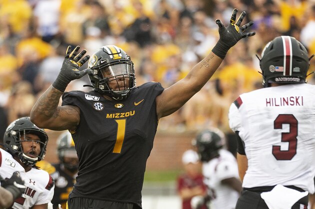 Missouri defensive lineman Jordan Elliott left, tries to block the pass of South Carolina quarterback Ryan Hilinski, right, during the third quarter of an NCAA college football game Saturday, Sept. 21, 2019, in Columbia, Mo. (AP Photo/L.G. Patterson) Missouri defensive lineman Jordan Elliott left, tries to block the pass of South Carolina quarterback Ryan Hilinski, right, during the third quarter of an NCAA college football game Saturday, Sept. 21, 2019, in Columbia, Mo. (AP Photo/L.G. Patterson)