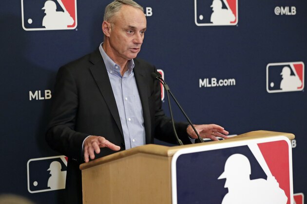 MLB Commissioner Rob Manfred answers questions at a press conference during MLB baseball owners meetings, Thursday, Feb. 6, 2020, in Orlando, Fla. (AP Photo/John Raoux)