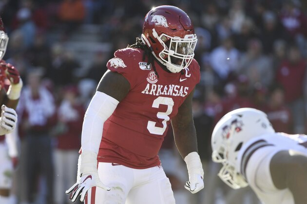 Arkansas defensive lineman McTelvin Agim gets ready to run a play against Mississippi State during an NCAA college football game, Saturday, Nov. 2, 2019 in Fayetteville, Ark. (AP Photo/Michael Woods)