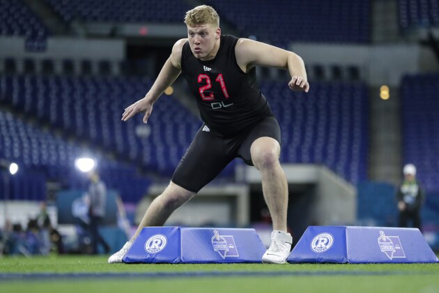 Penn State defensive lineman Rob Windsor runs a drill at the NFL football scouting combine in Indianapolis, Saturday, Feb. 29, 2020. (AP Photo/Michael Conroy)
