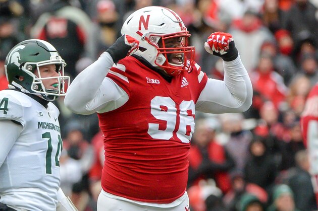 LINCOLN, NE - NOVEMBER 17: defensive lineman Carlos Davis #96 of the Nebraska Cornhuskers cheers a missed field goal as holder Brian Lewerke #14 of the Michigan State Spartans looks on in the first half at Memorial Stadium on November 17, 2018 in Lincoln, Nebraska. (Photo by Steven Branscombe/Getty Images)