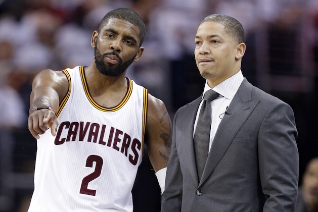 FILE  - In this April 20, 2016, file photo, Cleveland Cavaliers' Kyrie Irving, left, talks with head coach Tyronn Lue durng the second half of an NBA basketball playoff game against the Detroit Pistons in Cleveland. With Washington and Boston headed to a Game 7 on Monday, Cleveland's break since sweeping Toronto in the second round just grew a little longer. (AP Photo/Tony Dejak, File)