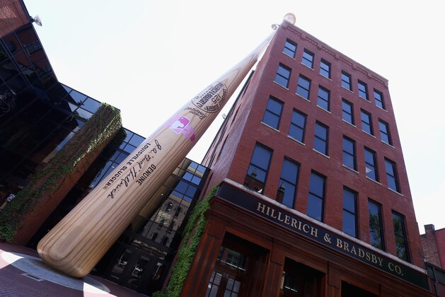 LOUISVILLE, KY - MAY 08:  The bat outside the Louisville Slugger Museum and Factory is adorned with the MLB Going to Bat Against Breat Cancer logo on May 8, 2014 in Louisville, Kentucky.  Major League Players will use pink bats on Mothers Day as part of the MLB Going to Bat Against Breat Cancer program which is in its 9the year  (Photo by Andy Lyons/Getty Images)