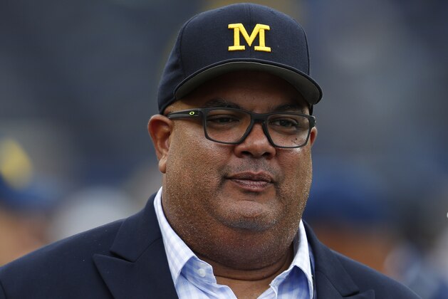 Warde J. Manuel, Director of Athletics, University of Michigan, watches before in the an NCAA football game against Maryland in Ann Arbor, Mich., Saturday, Oct. 6, 2018. (AP Photo/Paul Sancya)