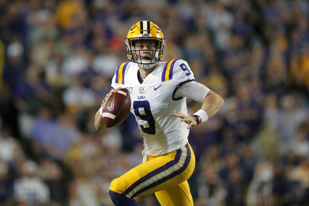 FILE - In this Nov. 30, 2019, file photo, LSU quarterback Joe Burrow (9) scrambles during the first half of an NCAA college football game against Texas A&M in Baton Rouge, La. Burrow is a posible first round pick in the NFL Draft Thursday night, April 23, 2020. (AP Photo/Gerald Herbert, File)