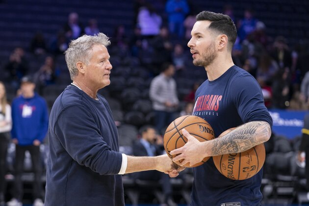 PHILADELPHIA, PA - DECEMBER 13: Head coach Brett Brown of the Philadelphia 76ers talks to JJ Redick #4 of the New Orleans Pelicans at the Wells Fargo Center on December 13, 2019 in Philadelphia, Pennsylvania. NOTE TO USER: User expressly acknowledges and agrees that, by downloading and/or using this photograph, user is consenting to the terms and conditions of the Getty Images License Agreement. (Photo by Mitchell Leff/Getty Images)