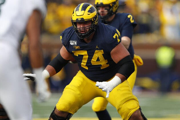 Michigan offensive lineman Ben Bredeson (74) blocks against Michigan State in the second half of an NCAA college football game in Ann Arbor, Mich., Saturday, Nov. 16, 2019. (AP Photo/Paul Sancya)