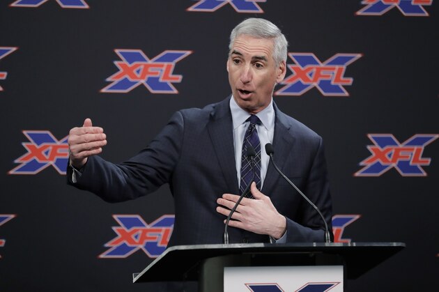 FILE - In this Feb. 25, 2019, file photo, XFL Football Commissioner Oliver Luck talks to reporters before introducing former NFL football quarterback Jim Zorn as the head coach for Seattle's XFL football team, in Seattle. Oliver Luck’s first year as the XFL’s commissioner has mostly been confined to the office and getting the league’s framework set up. The next couple months though are what Luck refers to as the fun part of preparing for next year’s return. (AP Photo/Ted S. Warren, File)
