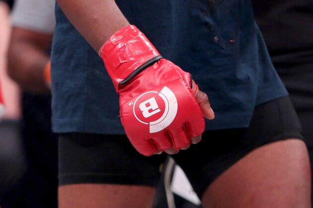 A closeup of the Bellator logo on a glow at Bellator 134 on Friday, Feb. 27, 2015, in Uncasville, CT.  (AP Photo/Gregory Payan)