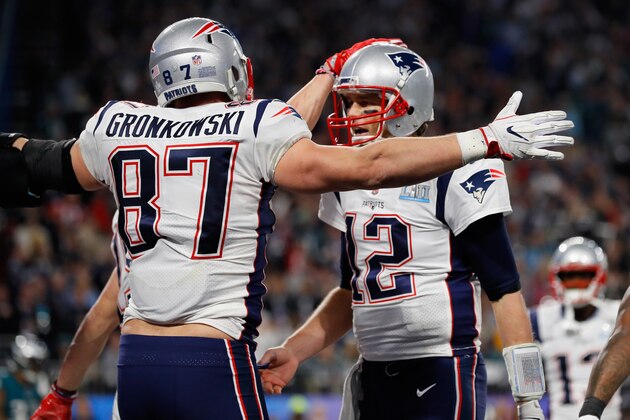 MINNEAPOLIS, MN - FEBRUARY 04: Rob Gronkowski #87 and Tom Brady #12 of the New England Patriots celebrate their 4-yard touchdown pass during the fourth quarter against the Philadelphia Eagles  in Super Bowl LII at U.S. Bank Stadium on February 4, 2018 in Minneapolis, Minnesota.  (Photo by Kevin C. Cox/Getty Images)