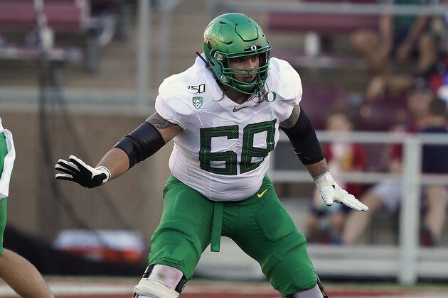 FILE - In this Sept. 21, 2019, file photo, Oregon offensive lineman Shane Lemieux (68) blocks against Stanford during the first half of an NCAA college football game, in Stanford, Calif. Lemieux was selected to The Associated Press All-Pac 12 Conference team, Thursday, Dec. 12, 2019.  (AP Photo/Tony Avelar, File)