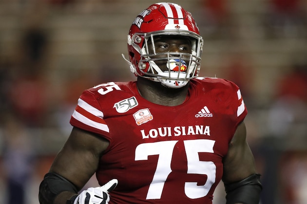 FILE - In this Sept. 7, 2019, file photo, Louisiana Lafayette offensive lineman Kevin Dotson (75) plays during an NCAA college football game against Liberty, in Lafayette, La. Dotson was selected to The Associated Press All-America team, Monday, Dec. 16, 2019. (AP Photo/Tyler Kaufman, File)