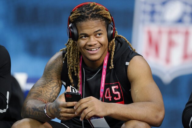 Ohio State defensive lineman Chase Young watches a drill at the NFL football scouting combine in Indianapolis, Saturday, Feb. 29, 2020. (AP Photo/Charlie Neibergall)