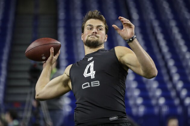 Washington quarterback Jacob Eason runs a drill at the NFL football scouting combine in Indianapolis, Thursday, Feb. 27, 2020. (AP Photo/Michael Conroy)