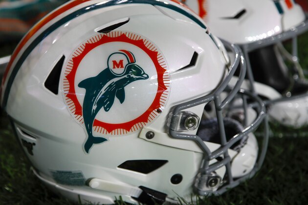 Miami Dolphins helmets on the sideline against the Pittsburgh Steelers in an NFL football game, Monday, Oct. 28, 2019, in Pittsburgh. (AP Photo/Don Wright)