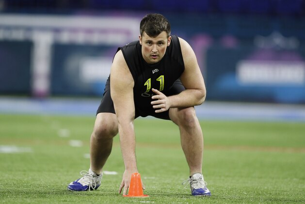 Boise State offensive lineman Ezra Cleveland runs a drill at the NFL football scouting combine in Indianapolis, Friday, Feb. 28, 2020. (AP Photo/Charlie Neibergall) Boise State offensive lineman Ezra Cleveland runs a drill at the NFL football scouting combine in Indianapolis, Friday, Feb. 28, 2020. (AP Photo/Charlie Neibergall)