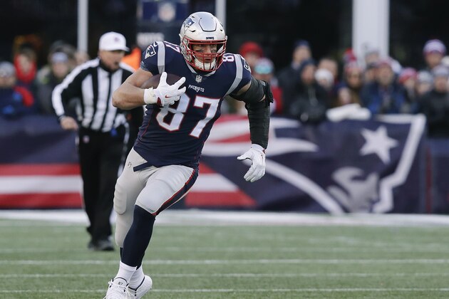 New England Patriots tight end Rob Gronkowsk runs after catching a pass against the New York Jets during the second half of an NFL football game, Sunday, Dec. 30, 2018, in Foxborough, Mass. (AP Photo/Charles Krupa)