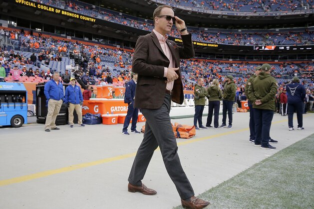 Former Denver Broncos quarterback Peyton Manning stands on the sidelines prior to an NFL football game against the Houston Texans, Sunday, Nov. 4, 2018, in Denver. (AP Photo/Jack Dempsey) Former Denver Broncos quarterback Peyton Manning stands on the sidelines prior to an NFL football game against the Houston Texans, Sunday, Nov. 4, 2018, in Denver. (AP Photo/Jack Dempsey)