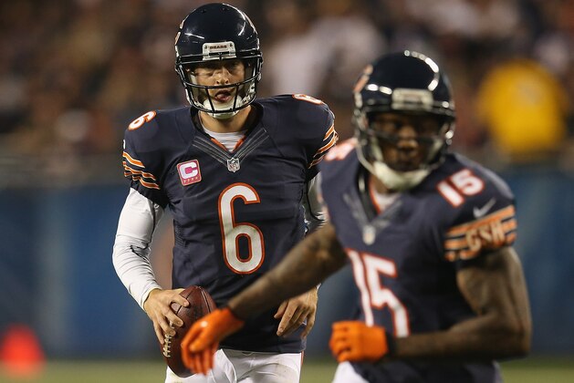 CHICAGO, IL - OCTOBER 22:  Jay Cutler #6 of the Chicago Bears rolls out as Brandon Marshall #15 runs his route against the Detroit Lions at Soldier Field on October 22, 2012 in Chicago, Illinois. The Bears defeated the Lions 13-7.  (Photo by Jonathan Daniel/Getty Images)