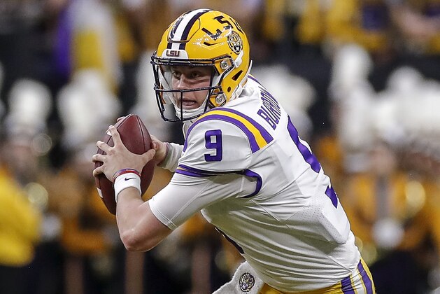 NEW ORLEANS, LA - JANUARY 13: Quarterback Joe Burrow #9 of the LSU Tigers on a running play during the College Football Playoff National Championship game against the Clemson Tigers at the Mercedes-Benz Superdome on January 13, 2020 in New Orleans, Louisiana. LSU defeated Clemson 42 to 25. (Photo by Don Juan Moore/Getty Images)