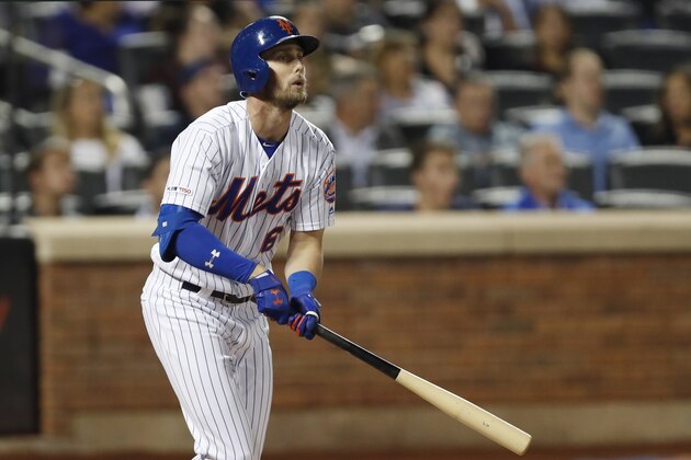 New York Mets' Jeff McNeil bats in a baseball game against the Miami Marlins, Wednesday, Sept. 25, 2019, in New York. McNeil was struck by a pitch that fractured his wrist and will be out for the rest of the season. (AP Photo/Kathy Willens)