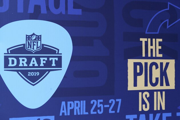 The logo for the 2019 NFL Draft is seen on a banner in Nashville on Tuesday, April 23, 2019. (AP Photo/Gregory Payan)