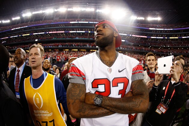 ARLINGTON, TX - JANUARY 12:  LeBron James of the Cleveland Cavaliers looks on after the Ohio State Buckeyes defeated the Oregon Ducks 42 to 20 in the College Football Playoff National Championship Game at AT&T Stadium on January 12, 2015 in Arlington, Texas.  (Photo by Christian Petersen/Getty Images)