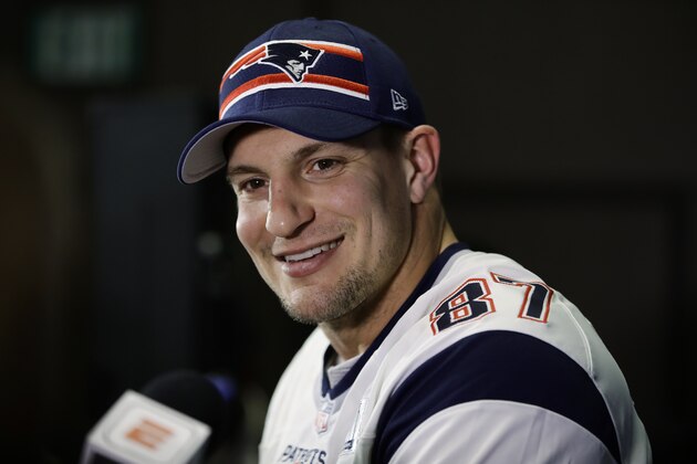 FILE - In this Jan. 30, 2019, file photo, New England Patriots' Rob Gronkowski speaks with members of the media during a news conference ahead of the NFL Super Bowl 53 football game in Atlanta. Fox Sports has hired Rob Gronkowski as an NFL analyst. The network announced on Tuesday, Oct. 8, 2019, that the former New England Patriots tight end will make his debut during Thursday night's pregame show before the Patriots-New York Giants game. (AP Photo/Matt Rourke, File)