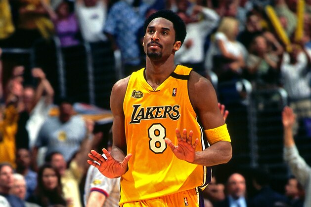 LOS ANGELES, CA - JUNE 19: Kobe Bryant #8 of the Los Angeles Lakers reacts to a play during Game Six of the NBA Finals against the Indiana Pacers on June 19, 2000 at the STAPLES Center in Los Angeles, California. NOTE TO USER: User expressly acknowledges and agrees that, by downloading and/or using this photograph, user is consenting to the terms and conditions of the Getty Images License Agreement. Mandatory Copyright Notice: Copyright 2000 NBAE (Photo by Andy Hayt/NBAE via Getty Images)