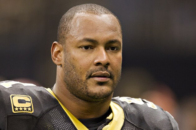 NEW ORLEANS, LA - NOVEMBER 28:   Will Smith #91 of the New Orleans Saints on the sidelines during a game against the New York Giants at Mercedes-Benz Superdome on November 28, 2011 in New Orleans, Louisiana.  The Saints defeated the Giants 49-24.  (Photo by Wesley Hitt/Getty Images)