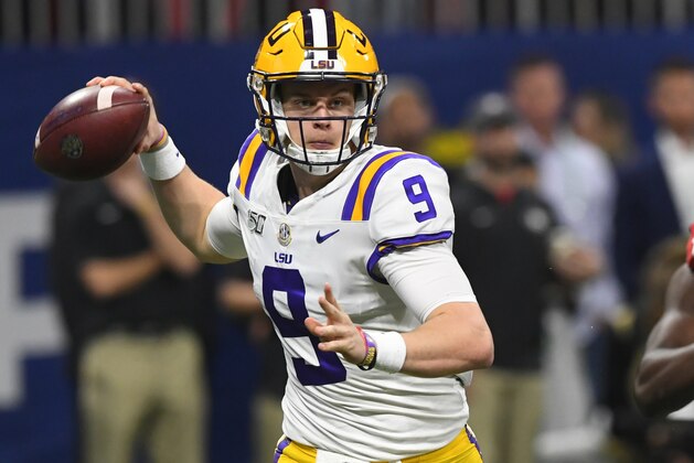 LSU quarterback Joe Burrow (9) works in the pocket against Georgia during the first half of the Southeastern Conference championship NCAA college football game, Saturday, Dec. 7, 2019, in Atlanta. (AP Photo/John Amis)