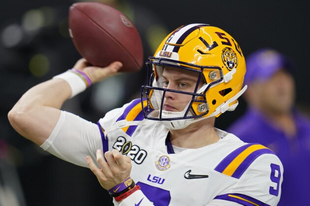 LSU quarterback Joe Burrow warms up before a NCAA College Football Playoff national championship game against Clemson Monday, Jan. 13, 2020, in New Orleans. (AP Photo/David J. Phillip)